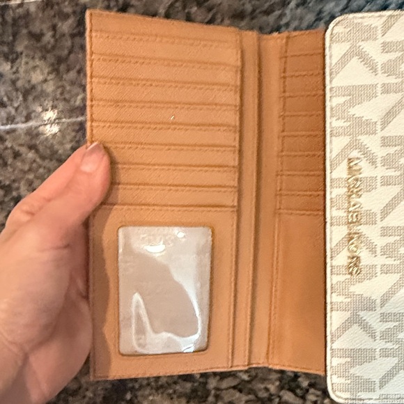 Michael Kors White Wallet with Gold Accents - Picture 2 of 4